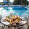 Astral Nirvana Suites- Half Board