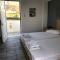 Tholos Rooms