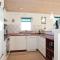 Foto: Three-Bedroom Holiday Home in Blokhus 8/22