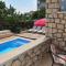 Seaside apartments with a swimming pool Supetar, Brac - 11360