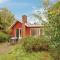 Foto: Three-Bedroom Holiday Home in Spottrup