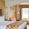 Atkinson Inn & Suites - 兰伯顿