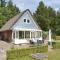 Foto: Three-Bedroom Holiday home with a Fireplace in Blåvand 9/40