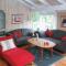 Foto: Three-Bedroom Holiday Home in Allinge 1/14