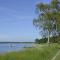 Rotes Strandhaus mit Boot am Salzhaff, 50m zum Strand