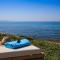 Find Tranquility at Villa Quietude A Stunning Beachfront Villa Rental - Agios Stefanos