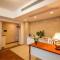 Foto: Shenzhen Phoenix Image Apartment One39 Branch 16/31