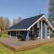 Foto: Three-Bedroom Holiday Home in Strandby