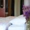 Foto: Jinguan Impression Hotel Apartment 7/24