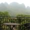 Foto: Lofty Mountains And Flowing Water Guesthouse 99/102