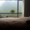 Foto: Lofty Mountains And Flowing Water Guesthouse 101/102