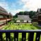 Foto: Xishuangbanna Dai Garden Shala Yard Yododo Inn 16/31