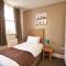 New County Hotel & Serviced Apartments by RoomsBooked
