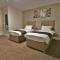 New County Hotel & Serviced Apartments by RoomsBooked