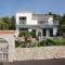 Apartments with parking space Njivice, Krk - 5325
