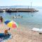 Apartments by the sea Podgora, Makarska - 11432