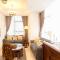 Comfy 2BR LAvenue Apartment By Travelio