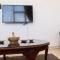 Comfy 2BR LAvenue Apartment By Travelio