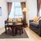 Comfy 2BR LAvenue Apartment By Travelio