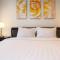 Comfy 2BR LAvenue Apartment By Travelio