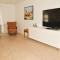 Foto: Three-Bedroom Holiday Home in Strandby 4/20