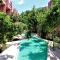 Foto: Chic Jungle 2 BR Condo by Happy Address 23/26