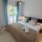 VACATION MARBELLA I Contemporary Central Apartment, Swimming-pool, 24-7 Security, a minute from the Marina, The Sea and Luxury Shopping