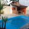 Foto: Casa Mongaguá a 100 m do mar com piscina