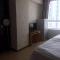 Foto: Harbin Comfort Apartment 6/58