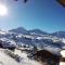 Duplex skis aux pieds Belle Plagne