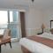 Foto: Qingdao Jinshan We+ Holiday Apartment (Wusi Square) 21/151