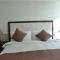 Foto: Qingdao Jinshan We+ Holiday Apartment (Wusi Square) 47/151