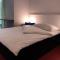 Foto: Aaron's Sleep-Well B&B Basel 27/31