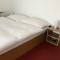 Foto: Aaron's Sleep-Well B&B Basel 26/31