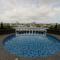 Zulanie Family Studio at DPerdana Apartment, Spacious and Cozy with POOL, Free Wifi & Netflix