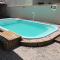 Bela casa, com internet, piscina e churrasqueira para descansar e desfrutar, dias de paz Bela casa, com internet, piscina e churrasqueira para descansar e desfrutar, dias de paz