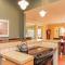 Screened porch pt water views hot tub walk to Saug