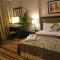 Executive Suites by Mourouj Gloria, Superior Hotel Apartments Foto: Executive Suites by Mourouj Gloria, Superior Hotel Apartments