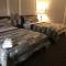 Foto: Grewals Inn and Suites by Elevate Rooms 44/61