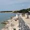 Apartments with parking space Novi Vinodolski - 11702