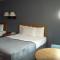 Quail's Nest Inn & Suites - أوساغ بيتش