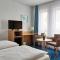 Appartis - Hotel am Stadtpark - 辛德尔芬根