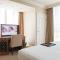 True 1BR Balcony Suite with Strip View at MGM Signature