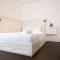 Minimalist Studio @ Bassura City Apartment By Travelio