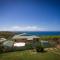 Foto: PETER COTTAGE 1770 HEADLAND 14/20