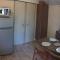 Mobil-home 4 pers dans Camping 4 étoiles La Palmyre - 拉帕尔米雷
