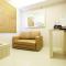 Easy Access to Mall 2BR Green Pramuka City Apartment By Travelio