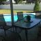PRIVATE HOT TUB, POOL BBQ fenced retreat, a mile walk from beaches pet Friendly