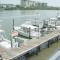 PRIVATE HOT TUB, POOL BBQ fenced retreat, a mile walk from beaches pet Friendly
