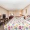 Foto: Grewals Inn and Suites by Elevate Rooms 19/61